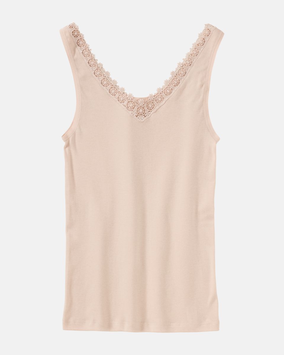 Achselhemd in honey aus der Serie Silke, flach auf einer Oberfläche liegend.