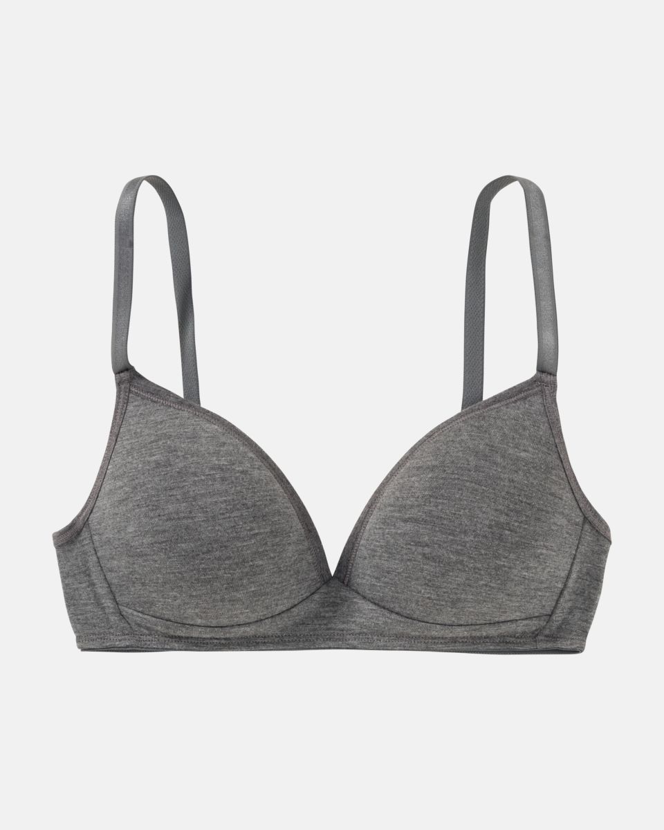 Schalen BH Triangle in grau mélé aus der Serie Swenja, flach auf einer Oberfläche liegend.
