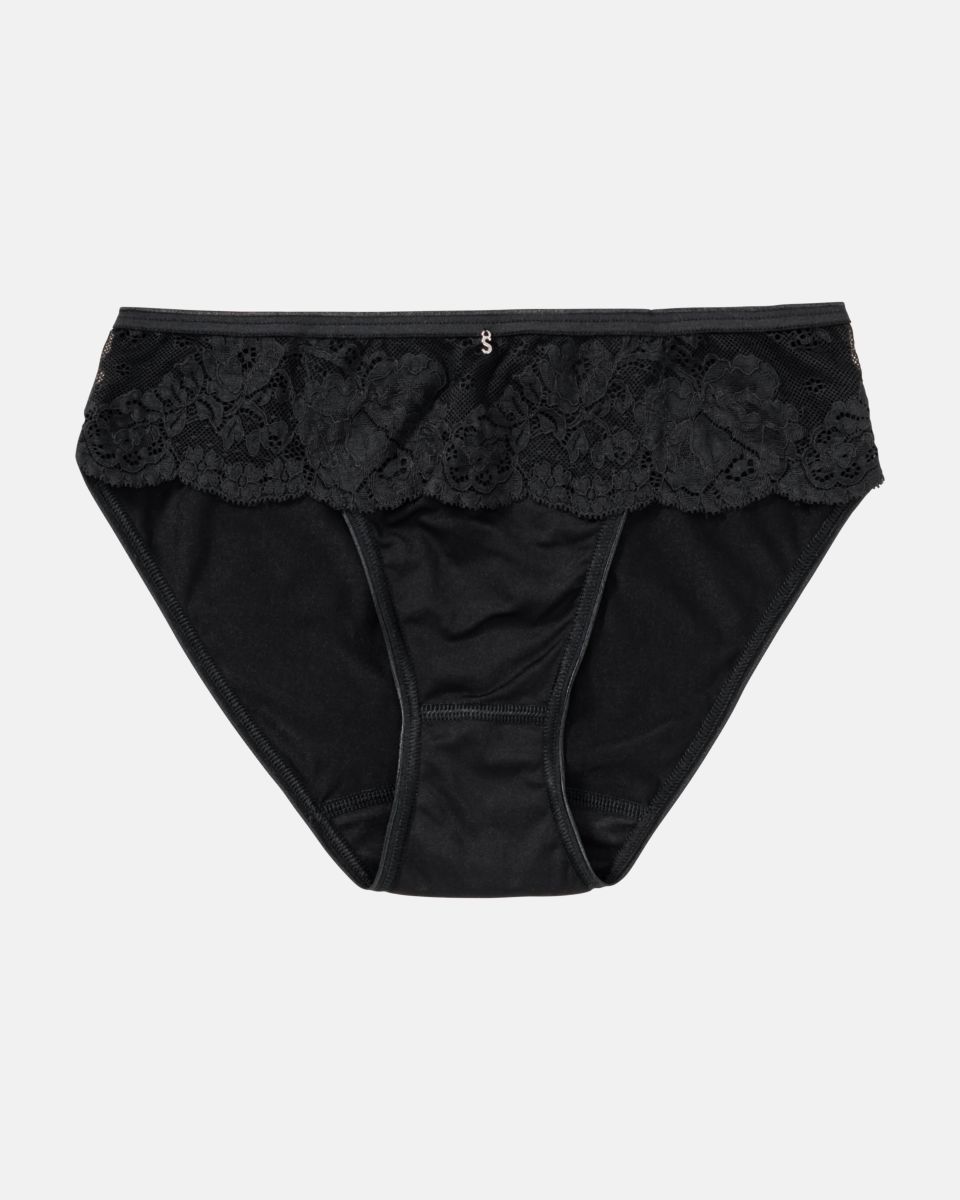 Bikinislip in schwarz aus der Serie Severine, flach auf einer Oberfläche liegend.