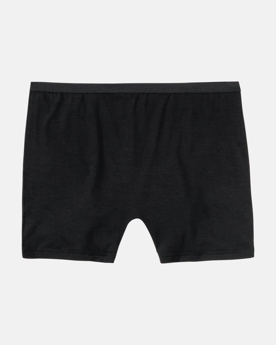 Pant in schwarz aus der Serie Sanja, flach auf einer Oberfläche liegend.