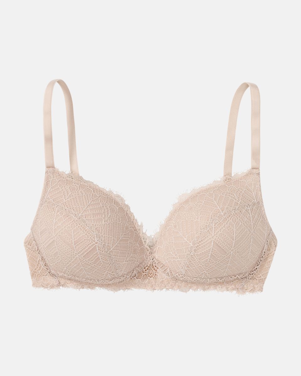 Schalen BH Triangle in cashew aus der Serie Ronja, flach auf einer Oberfläche liegend.