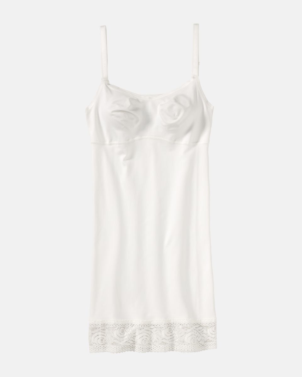 Bodydress gemoldet in elfenbein aus der Serie Inshape, flach auf einer Oberfläche liegend.