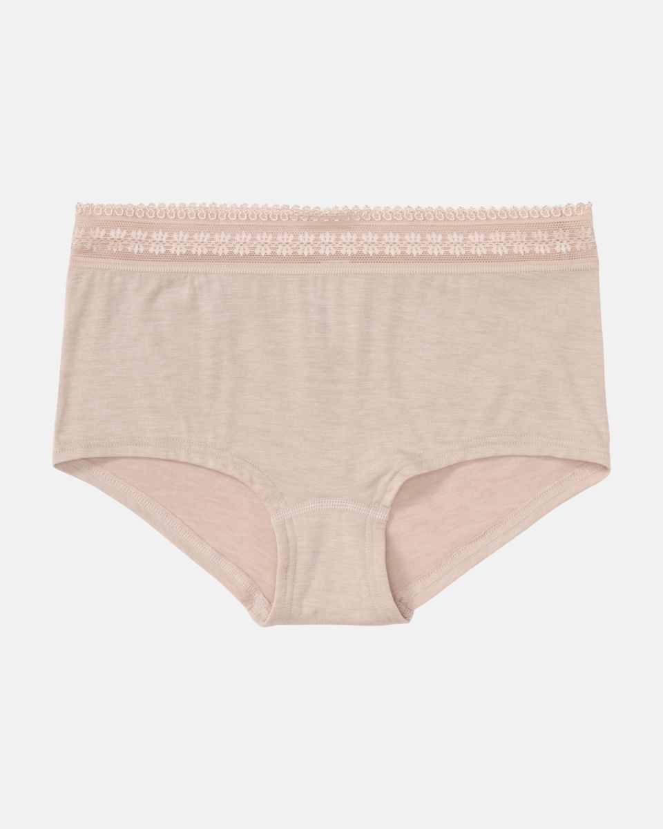 Pant in cashew mélé aus der Serie Raphaela, flach auf einer Oberfläche liegend.