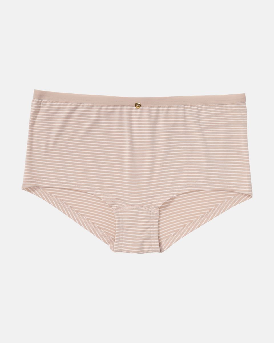 Pant in cashew / off white aus der Serie Rebecca, flach auf einer Oberfläche liegend.