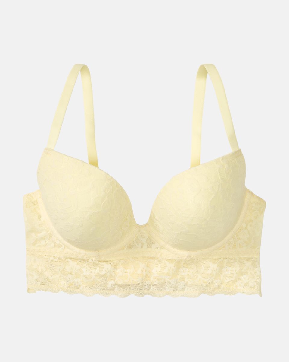 Schalen BH Longline in zitrone aus der Serie Lacy, flach auf einer Oberfläche liegend.