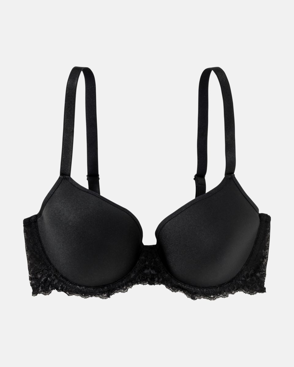 Schalen BH Spacer Cup in schwarz aus der Serie Priscilla, flach auf einer Oberfläche liegend.