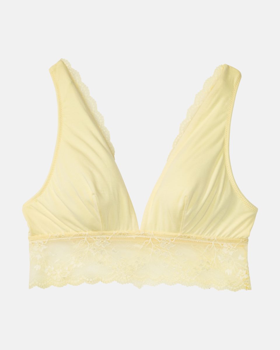 Bustier in zitrone aus der Serie Romy, flach auf einer Oberfläche liegend.