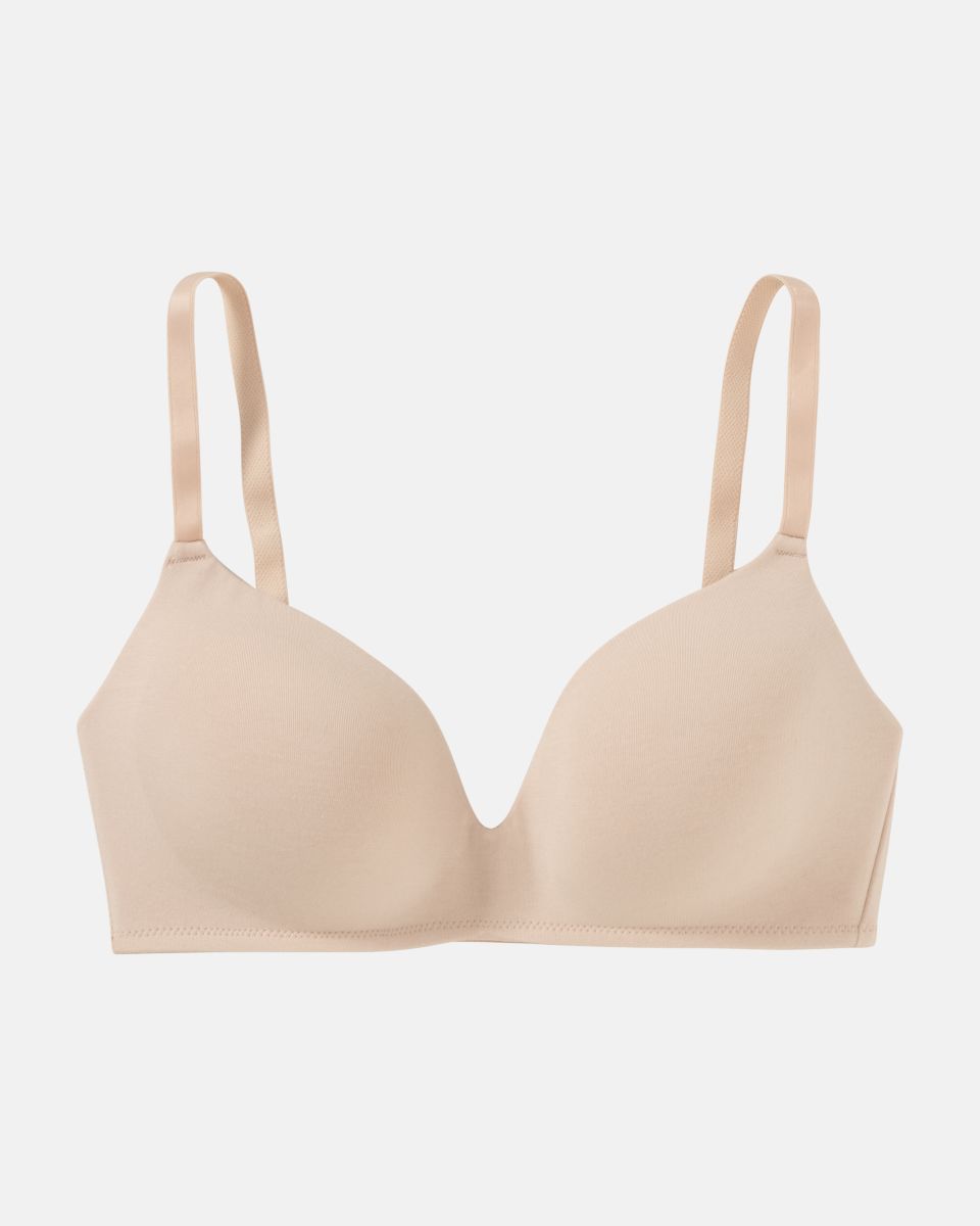 Schalen BH non wired in skin aus der Serie Softfeeling, flach auf einer Oberfläche liegend.