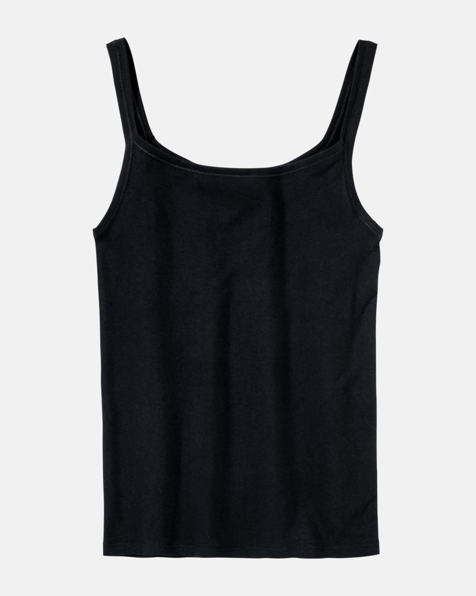Trägerhemd in schwarz aus der Serie Bio Cotton plus, flach auf einer Oberfläche liegend.